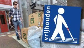 blinde man en obstakel op geleidelijn